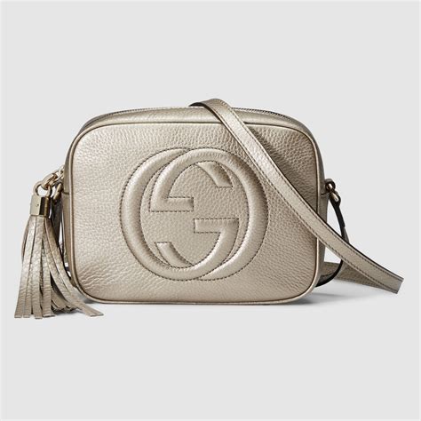 gold gucci disco bag|Gucci bag with snake buckle.